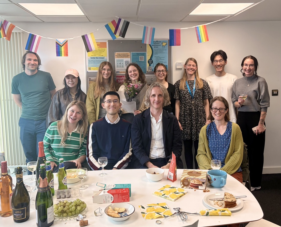 Maya (4th from left, back) surrounded by members of the Phonetics Lab (back), together with supervisors Danielle (left, front), Sam (centre right, front), Claire (right, front) and internal examiner Justin (centre left, front).